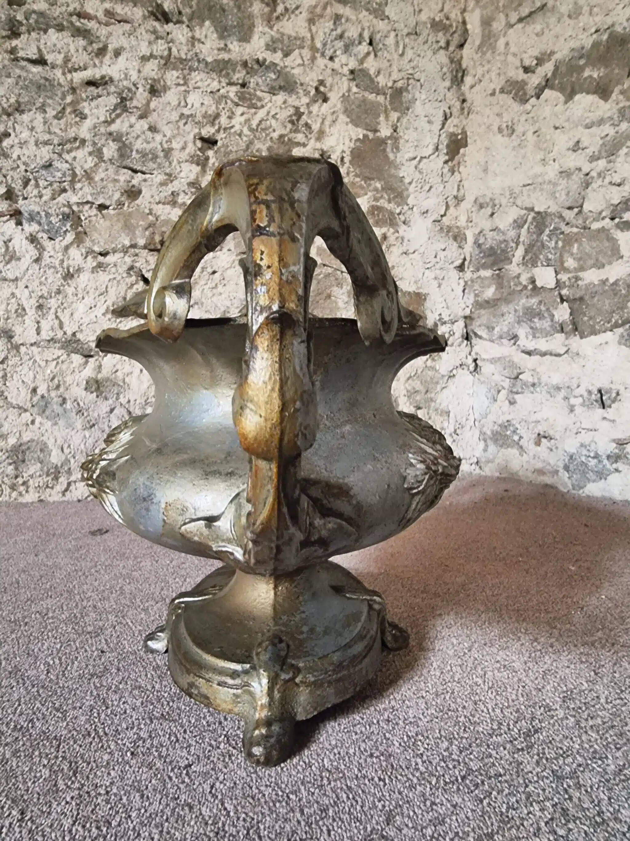 Large antique cast iron planter on a stand, France, circa 1900.