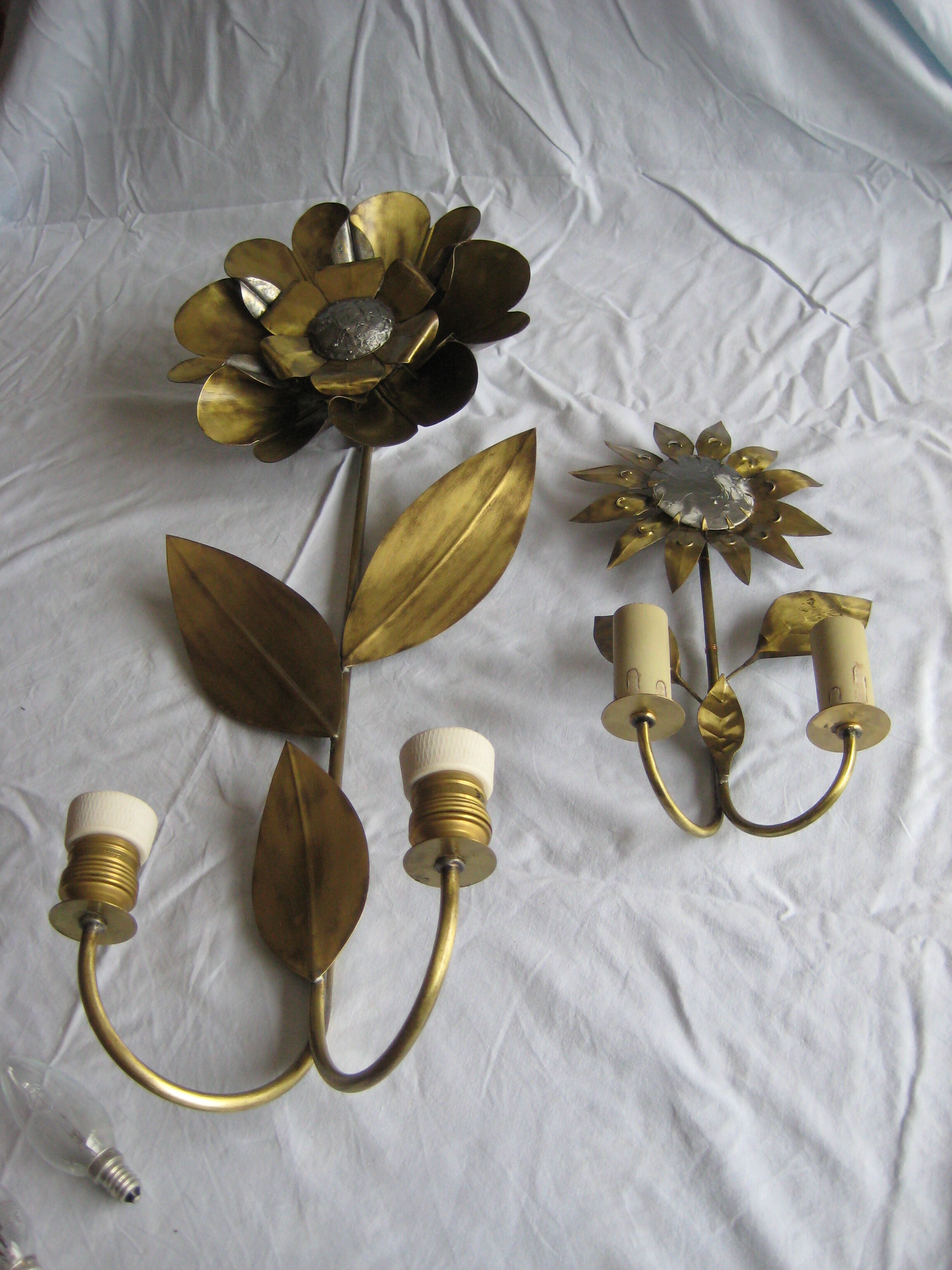 Brass sunflower sconces