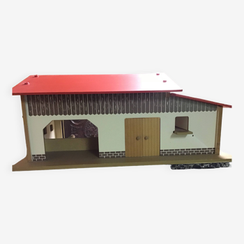 Wooden farm for children with its animals.