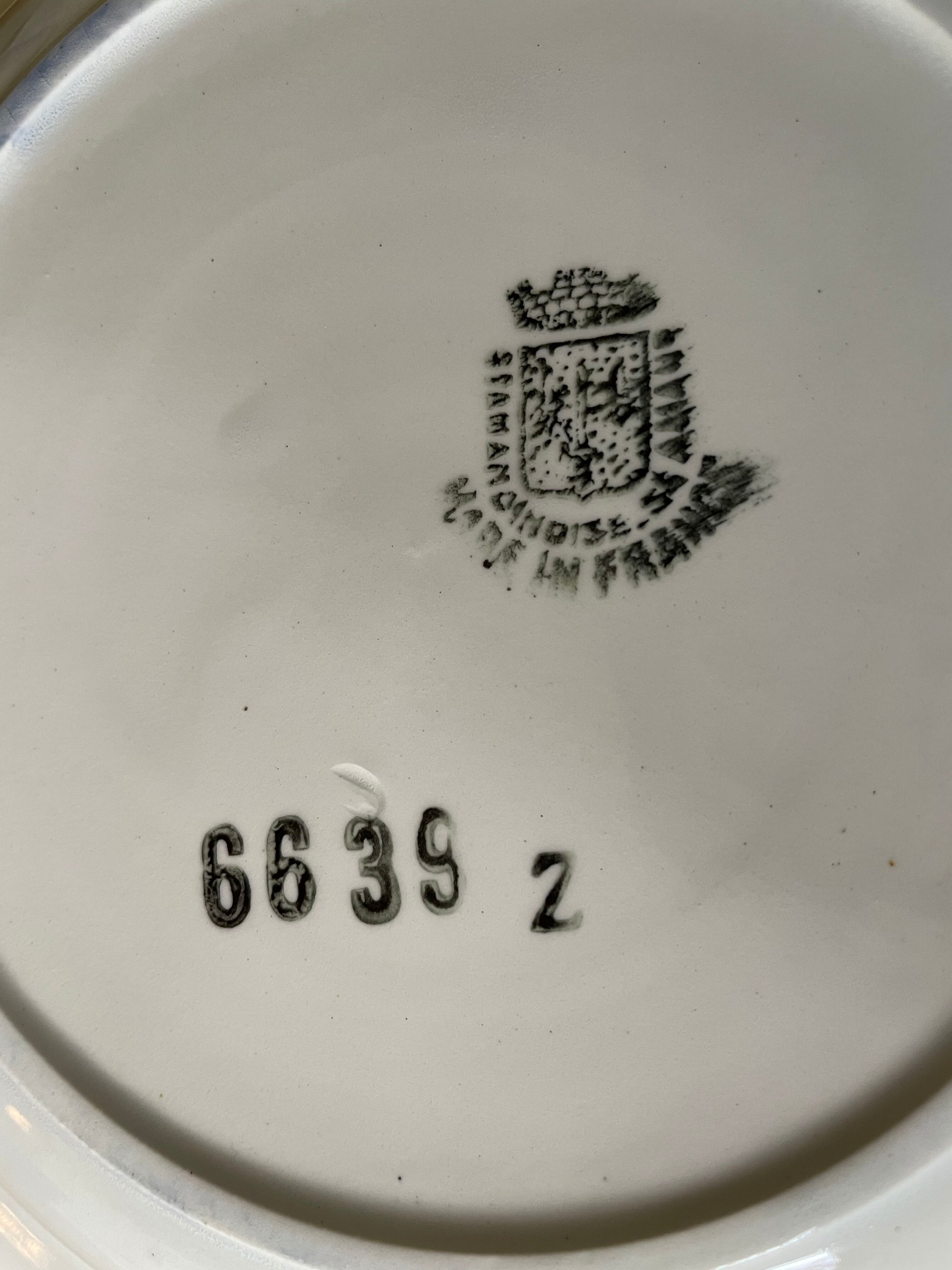 Saint Amand hollow plates decorated with red and blue flowers