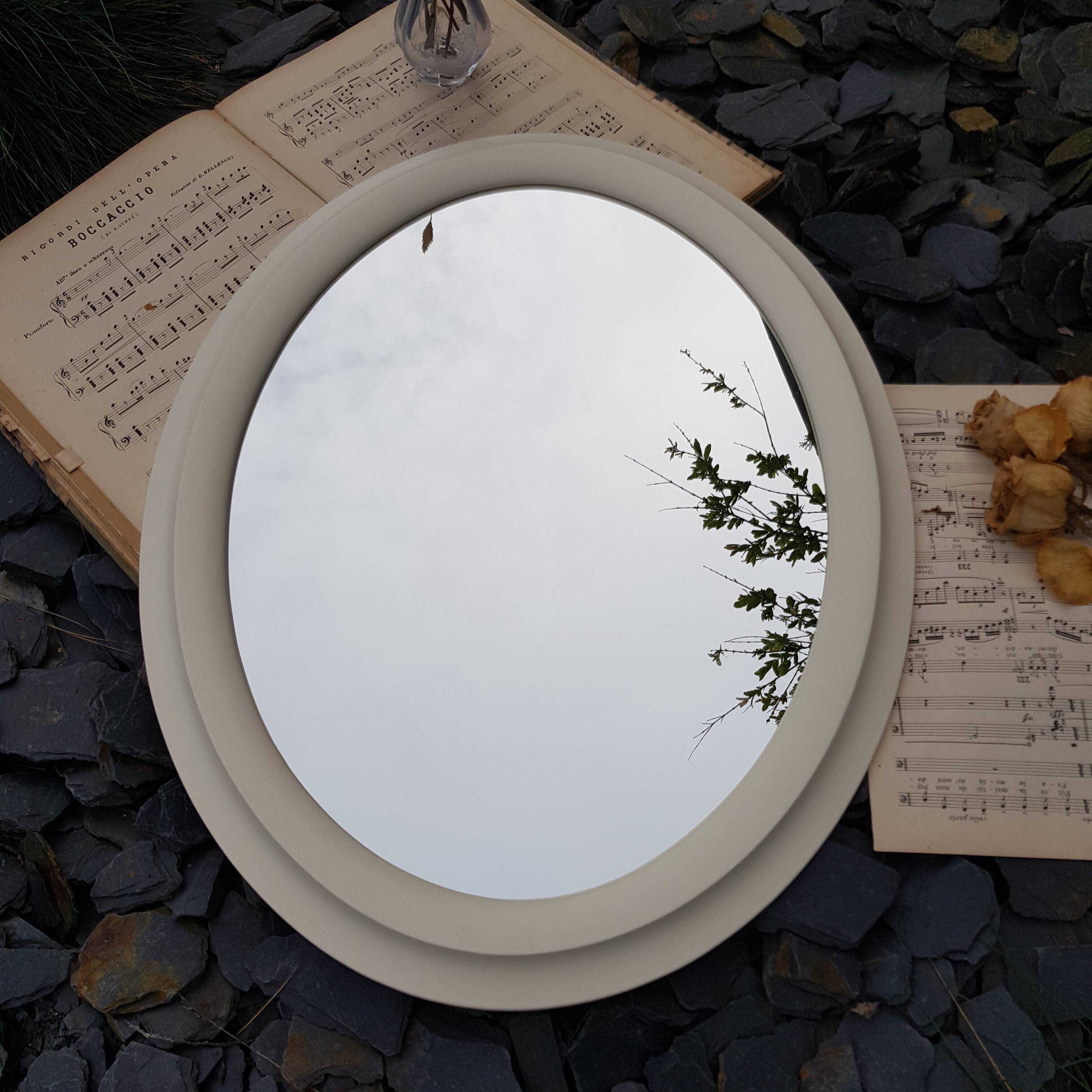 Oval wooden mirror