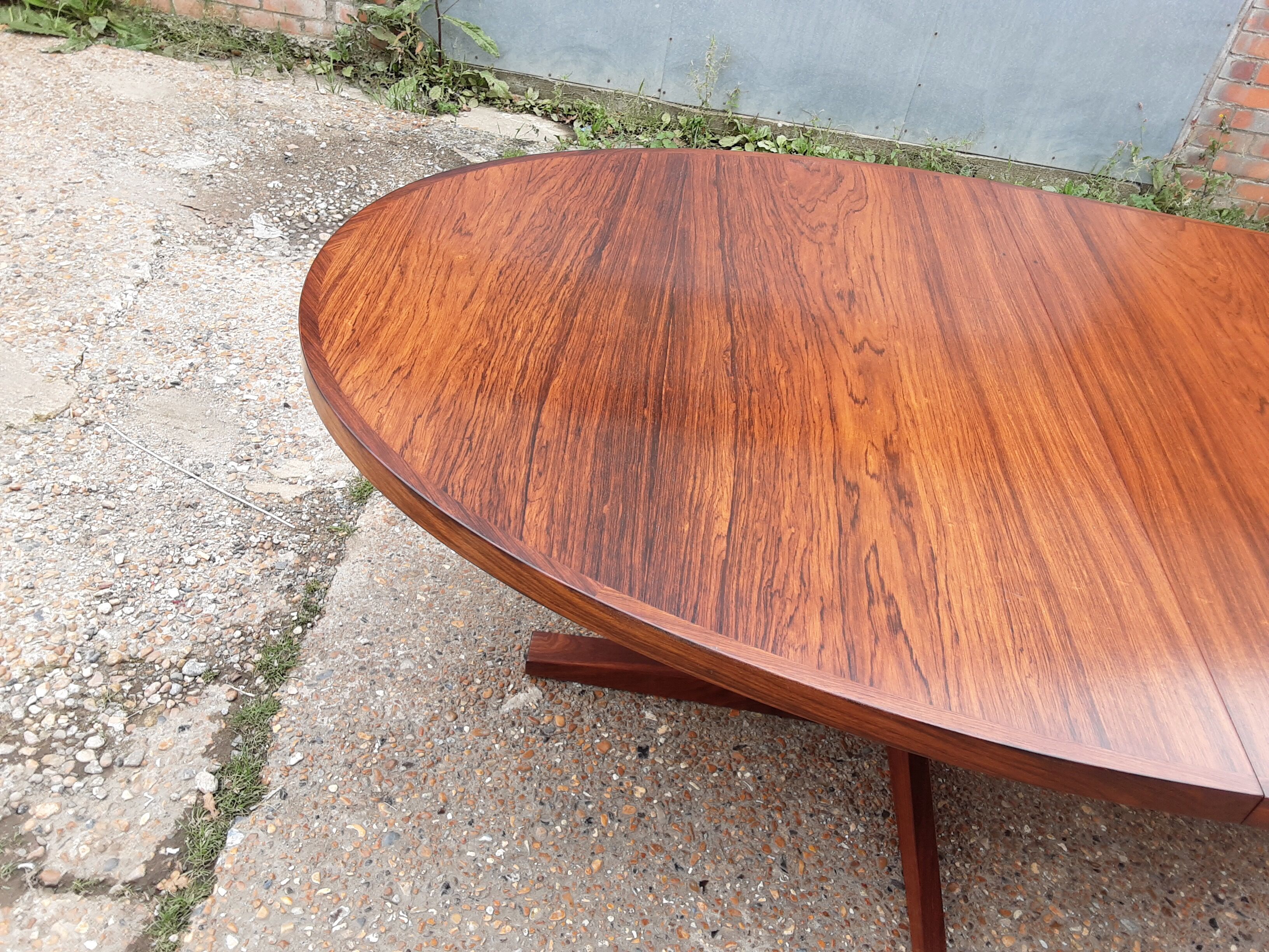 Mid century rosewood extendable dining table by John Mortensen