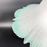 Frosted glass flower pendant with a water green edge.