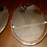 2 bathroom mirrors in silver oval holders