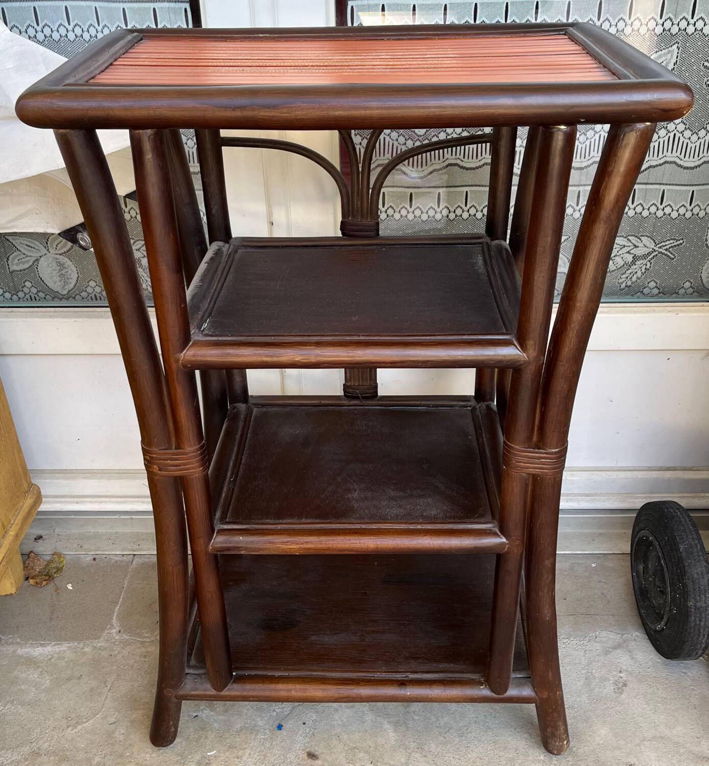 Shelf on rattan legs