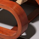 An exceptionally rare mahogany recliner crafted in Italy during the 1950s"