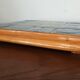 Vintage wooden and ceramic trivet