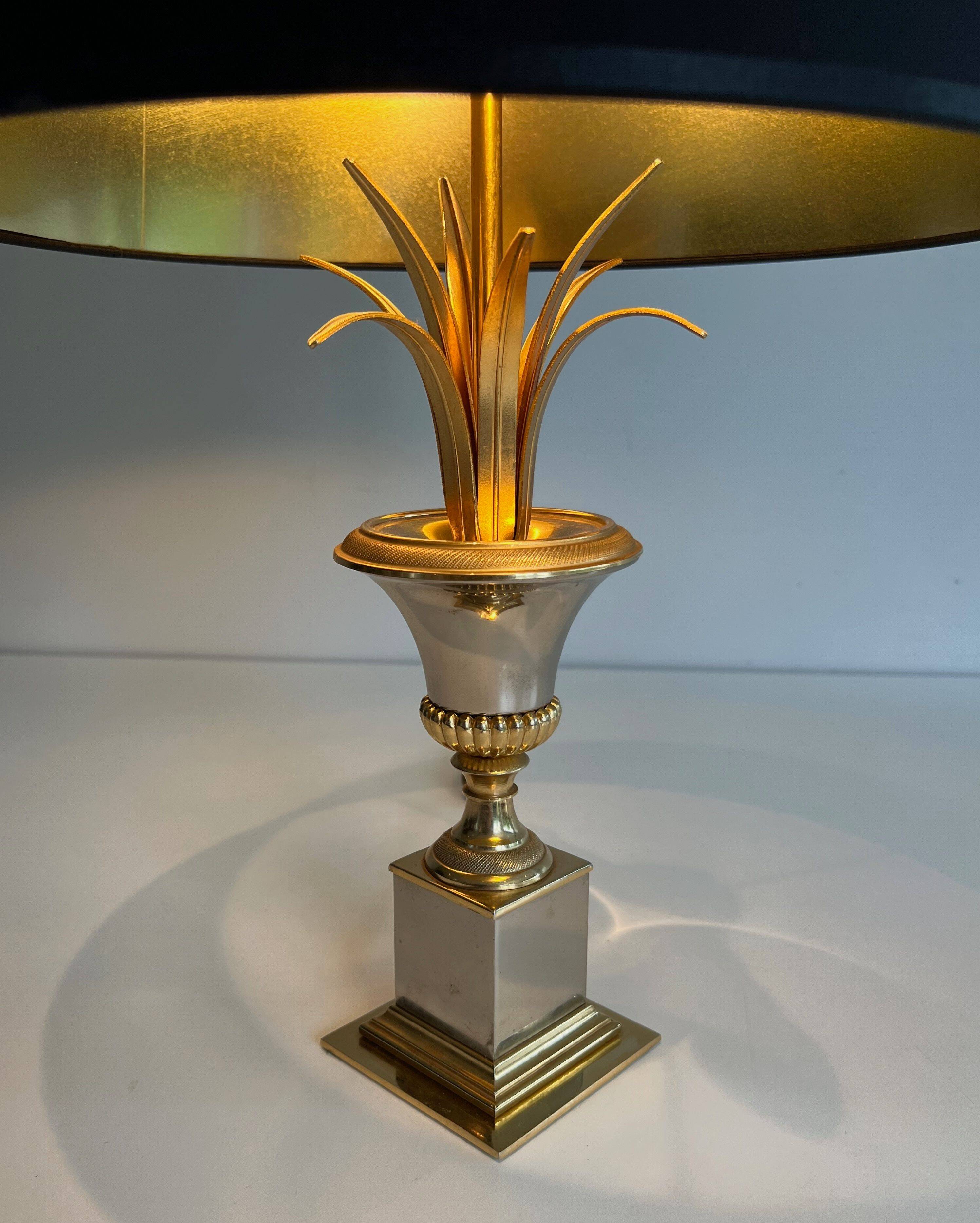 Pair of palm lamps in chrome and brass in the style of Maison Charles. Circa 1970.
