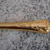 Old gold metal pie shovel