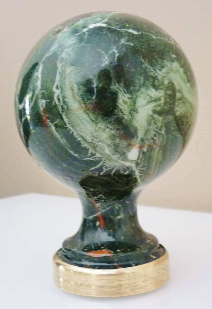 Stair railing ball in enameled cast iron imitating veined green, sea green marble.
