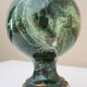 Stair railing ball in enameled cast iron imitating veined green, sea green marble.