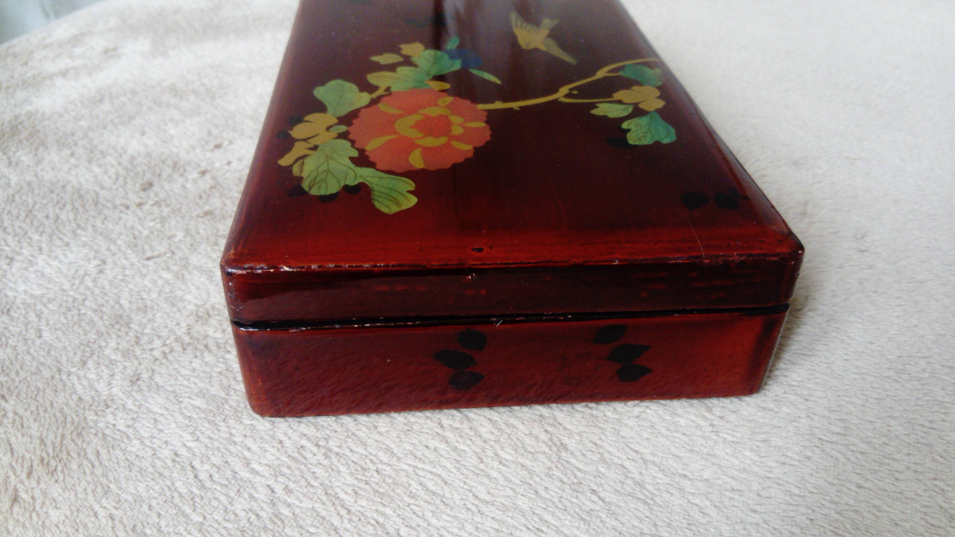 Old lacquered wooden box with china or japan decoration, bird and flower