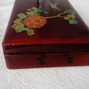 Old lacquered wooden box with china or japan decoration, bird and flower