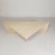 Mid-Century travertine coffee table with a triangular top, 1970s.