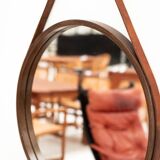 Round mirror in walnut