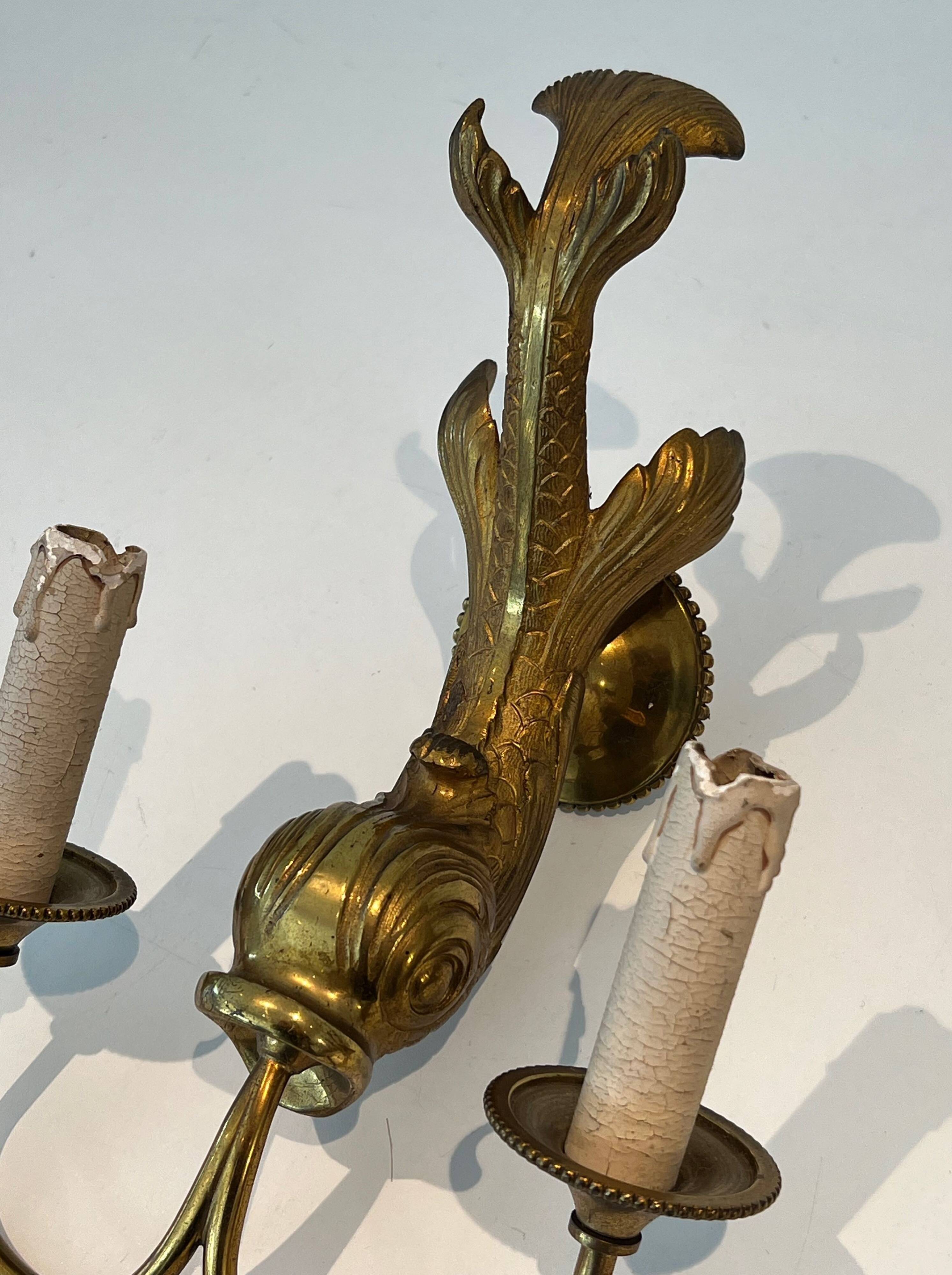 Pair of bronze wall sconces with dolphins by Maison Jansen
