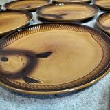 Set of ten Moulin des Loups fish plates.