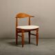 Henning Kjærnulf dining chairs set in Oak and Off White Bouclé, Denmark, 1960s