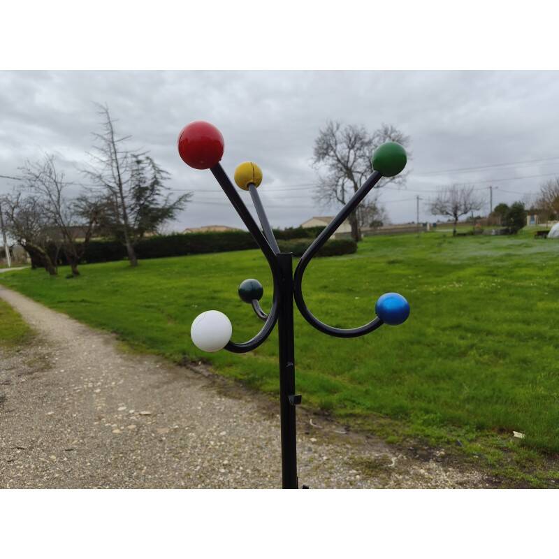 Vintage coat rack, metal and wooden balls.