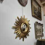 Miroir de sorcière forme soleil doré vintage 1970