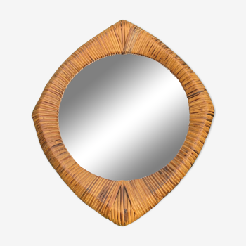 Vintage rattan mirror of atypical and original shape.