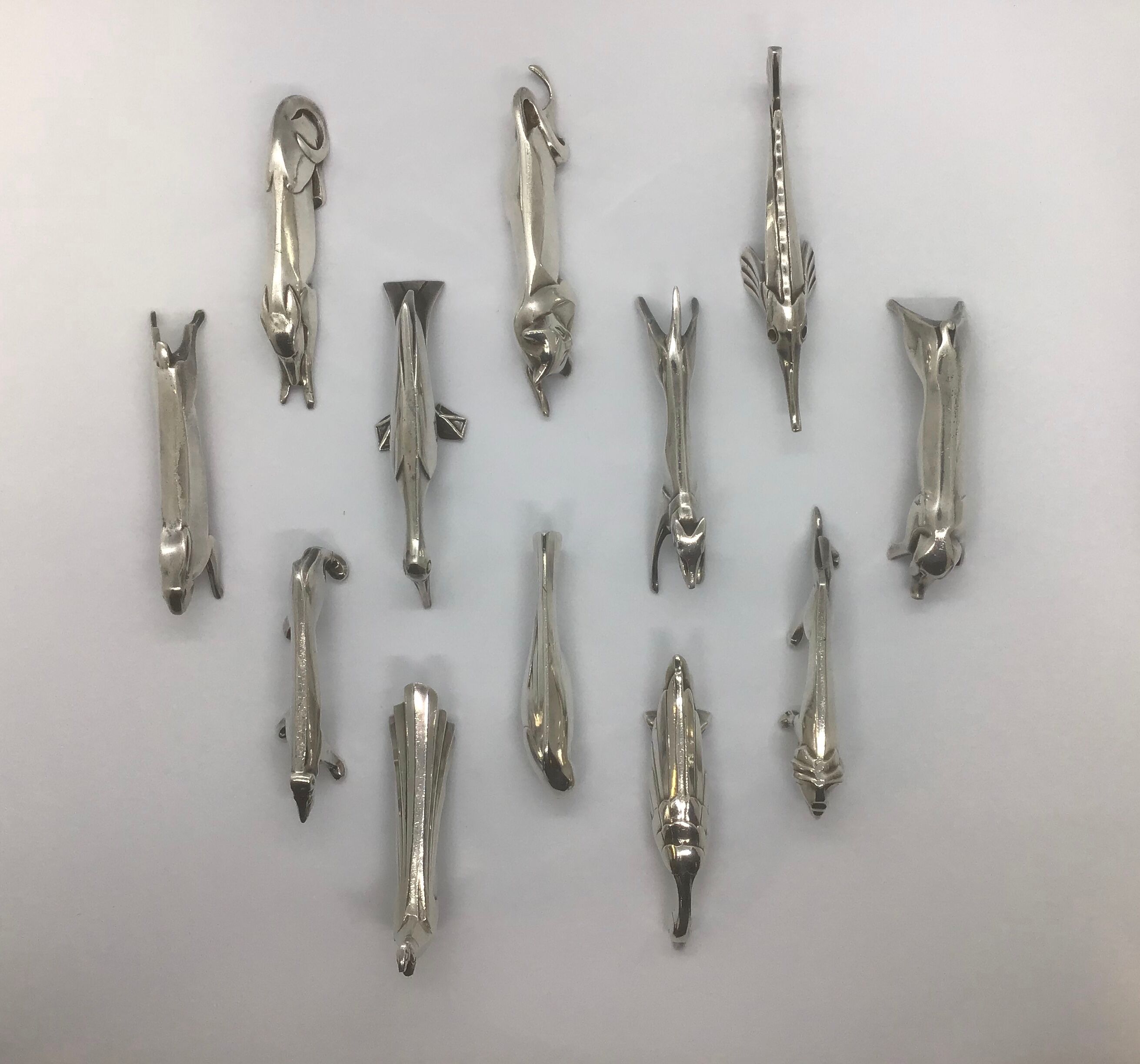 12 knife holders by Edouard Sandoz for the Goldsmith Gallia-Christofle