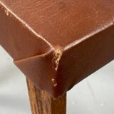 Small stool or footrest in wood and leather