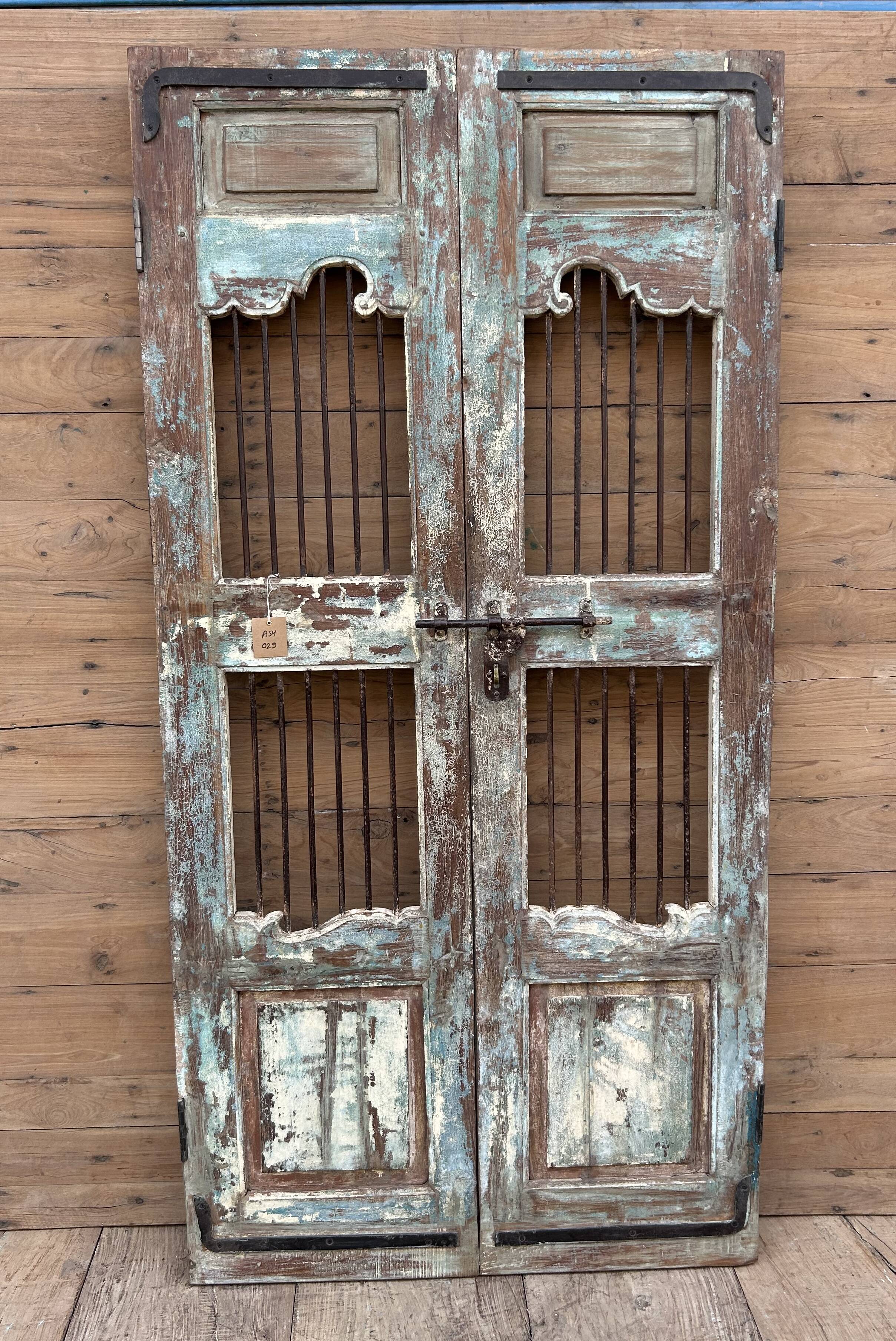 Art Deco patio door in Burmese teak with original patina.