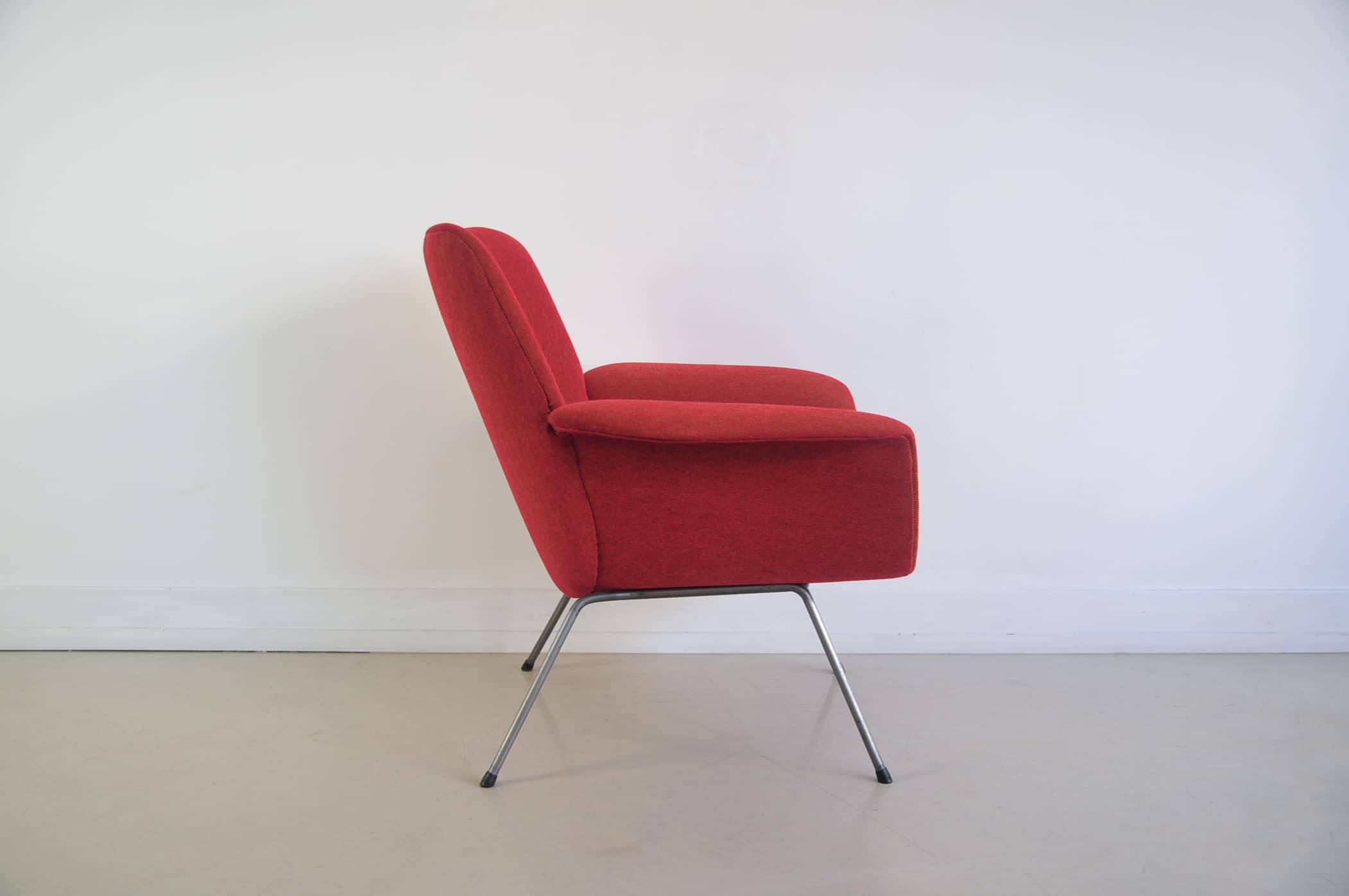 Red armchair with metal legs