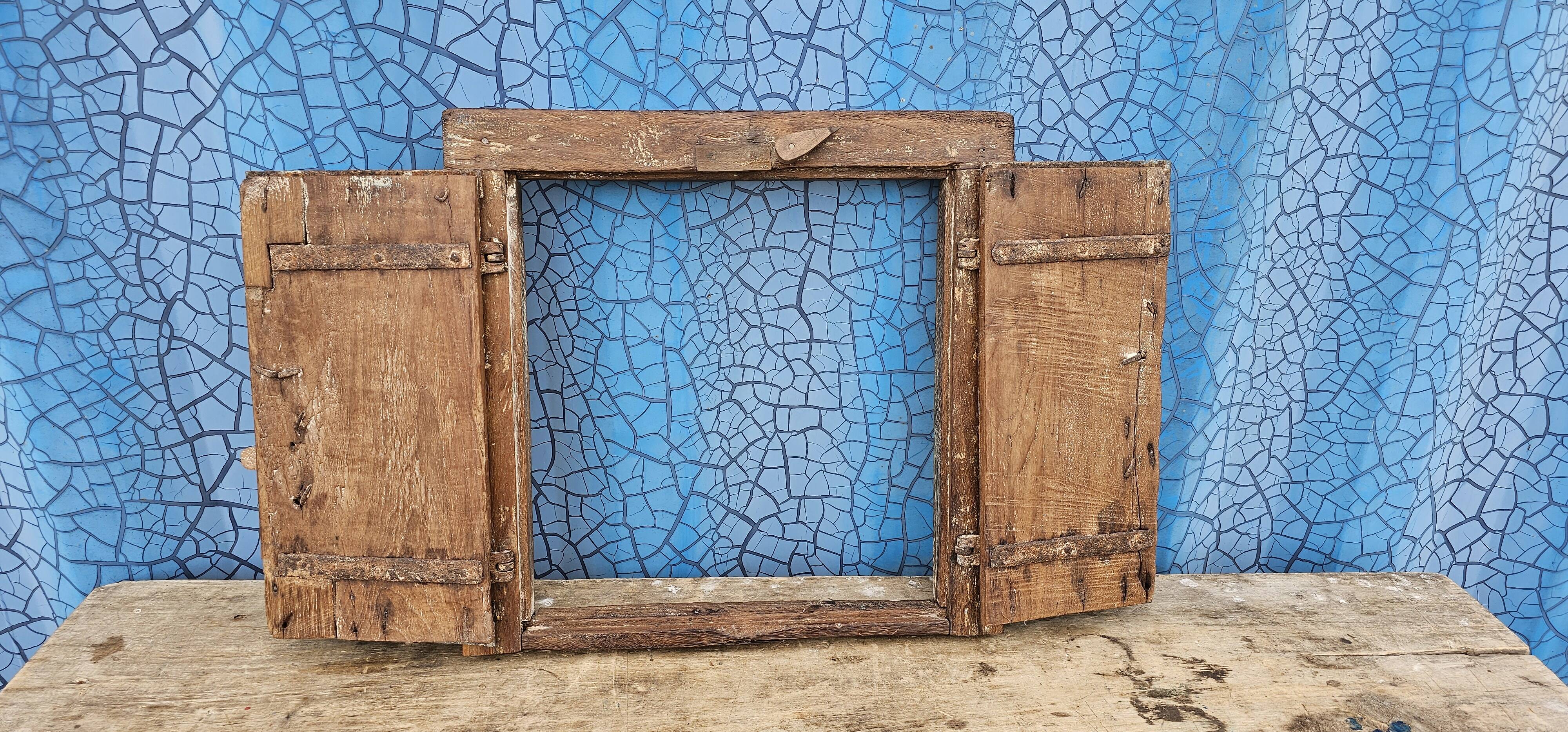 Old wooden tribal window
