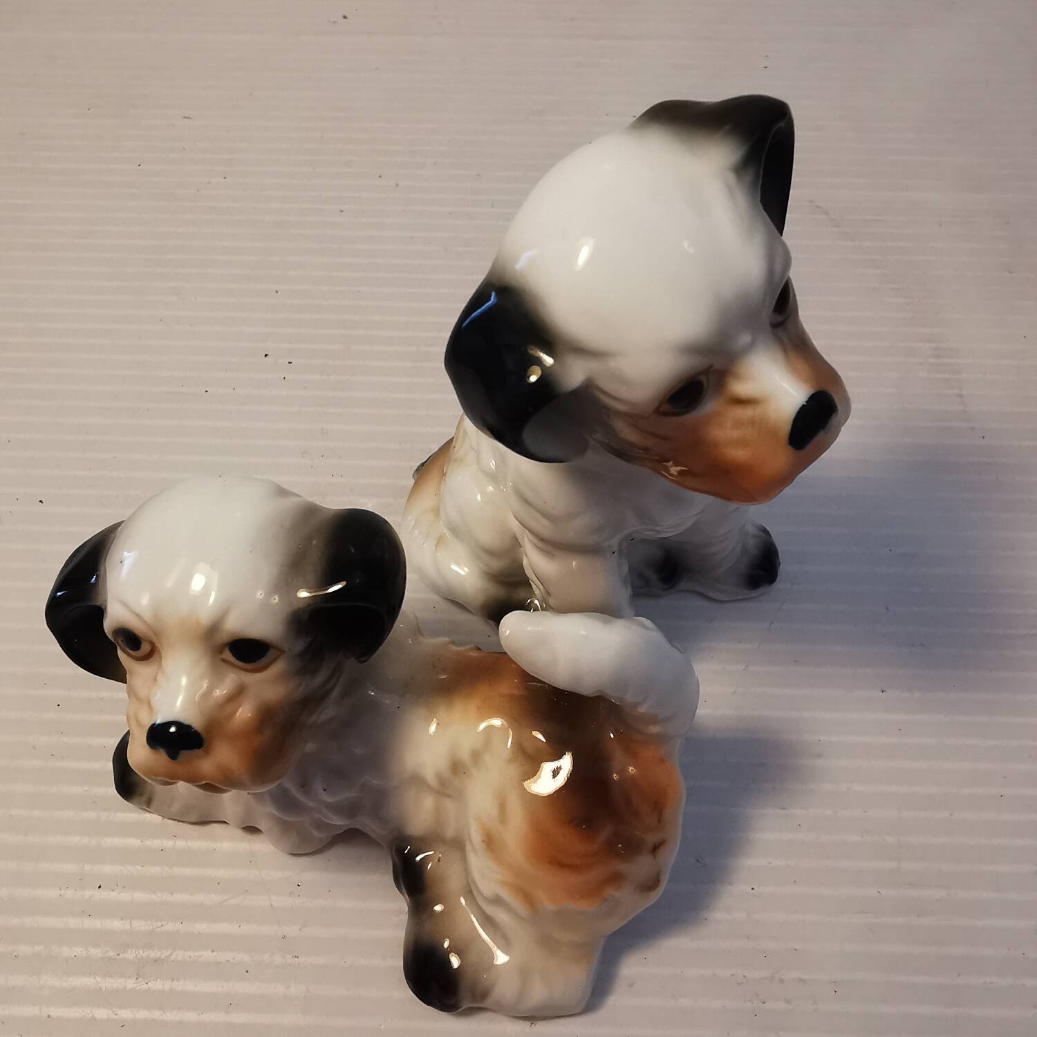 Pair of vintage ceramic terrier puppy dog figurines
