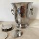 Silver coaster and holder, shell, 80s