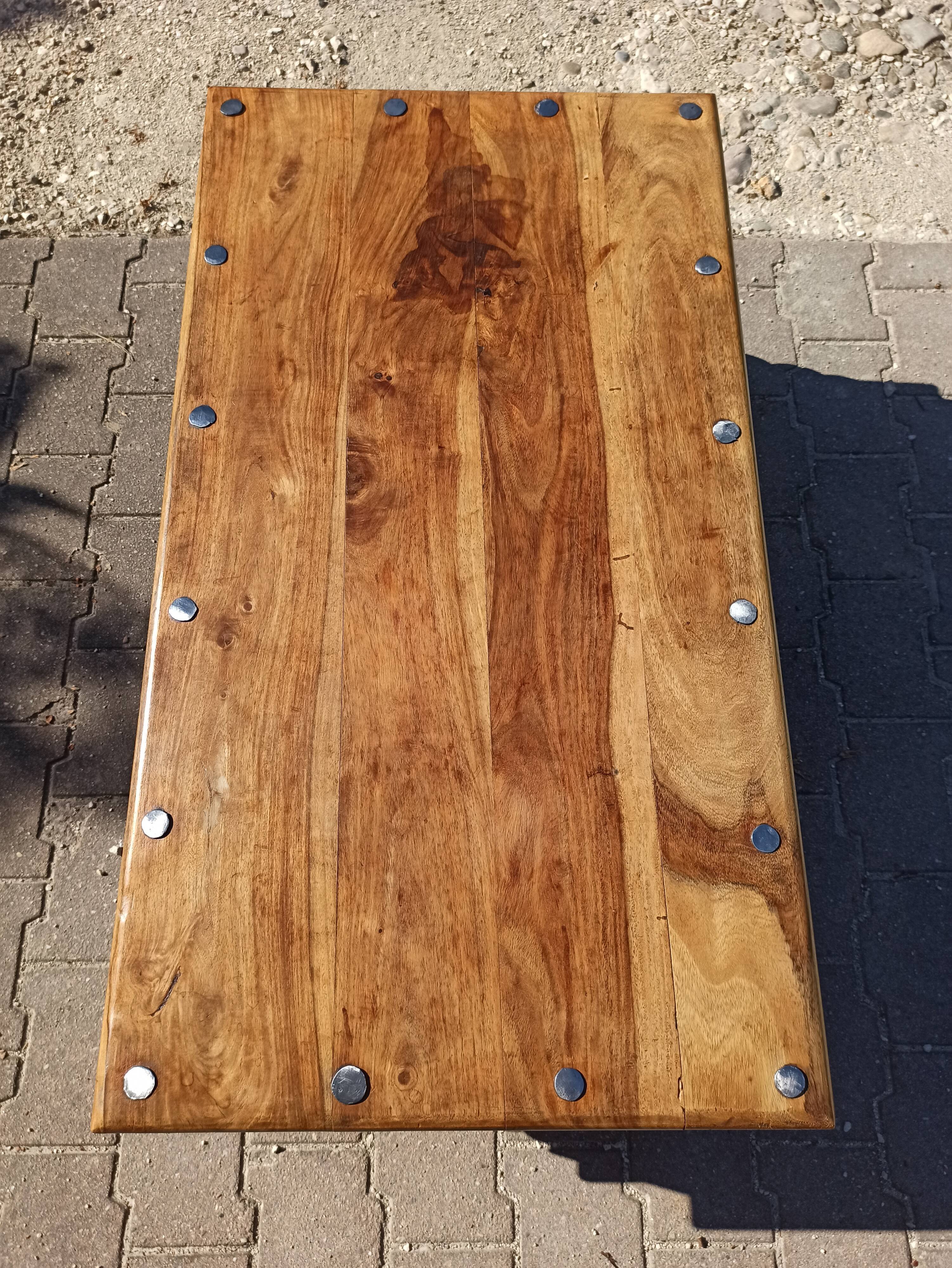 Medieval-inspired red oak coffee table with ironwork
