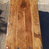 Medieval-inspired red oak coffee table with ironwork