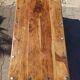 Medieval-inspired red oak coffee table with ironwork