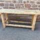 Primitive industrial table workbench in raw natural wood vintage bohemian trade store