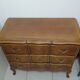 Chest of drawers crossbow in cherry tree
