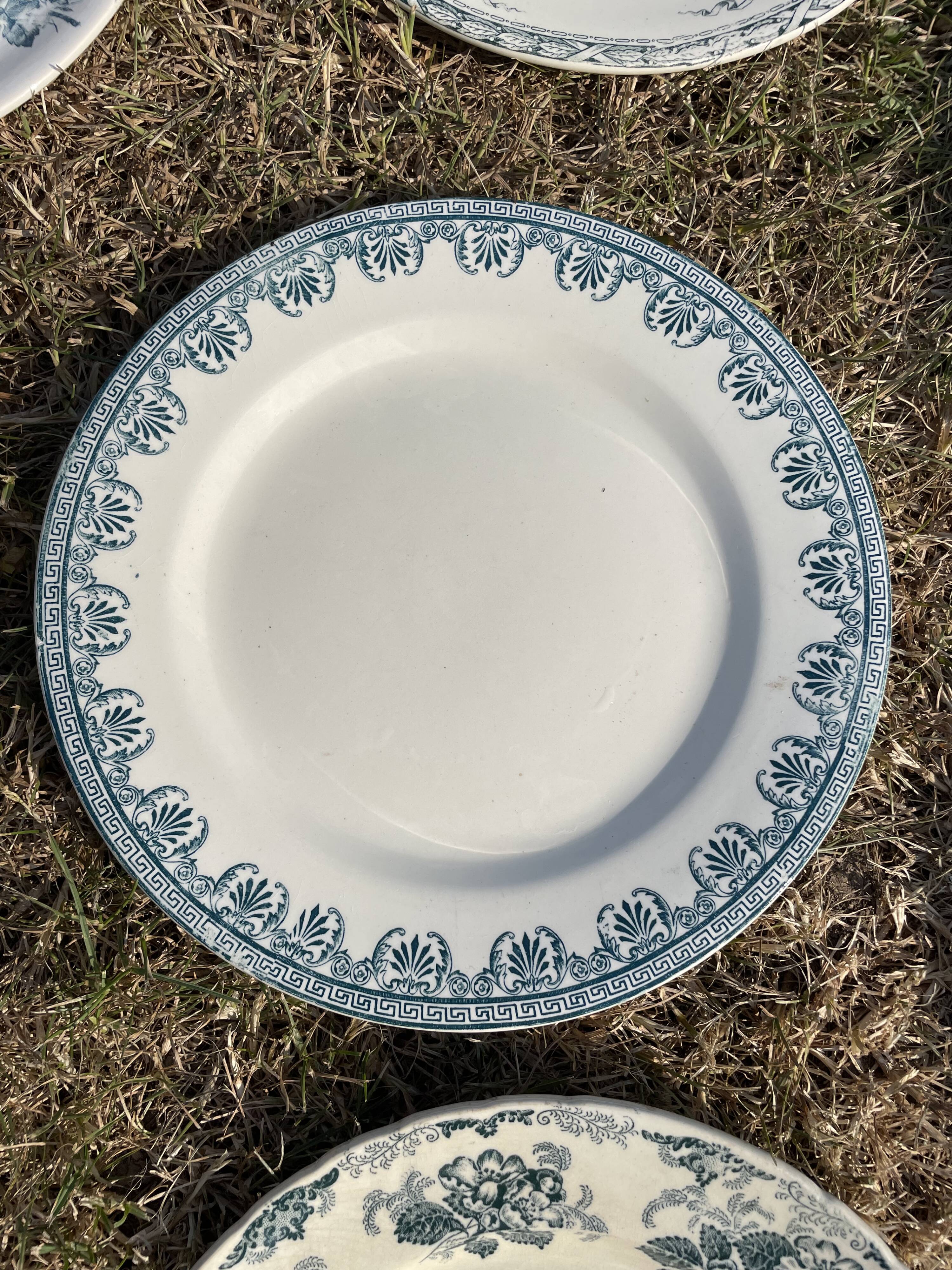 Set of 8 mismatched iron earth flat plates