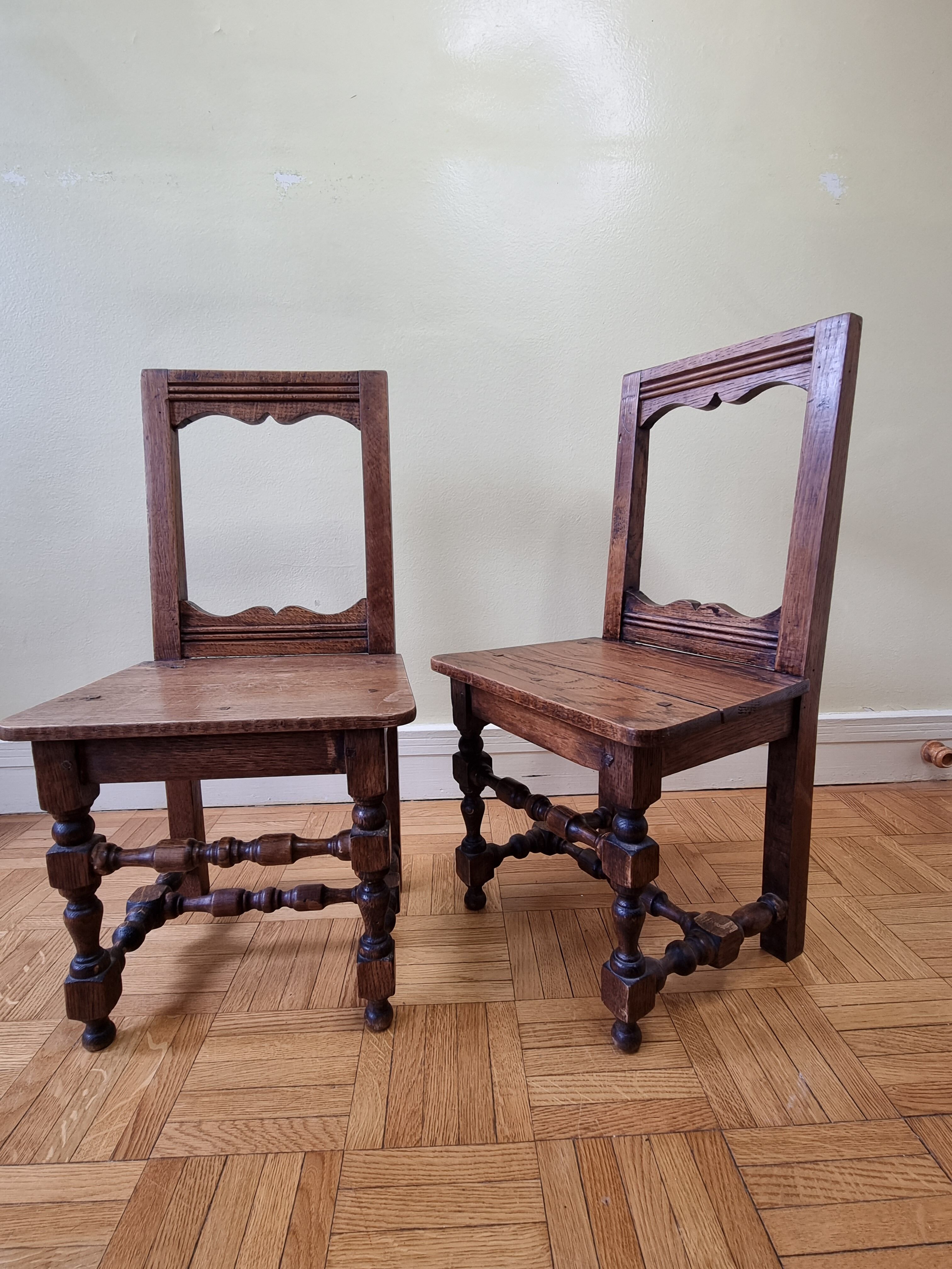 Pair of old children's chairs made of solid wood