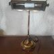 Brass articulated piano or desk lamp
