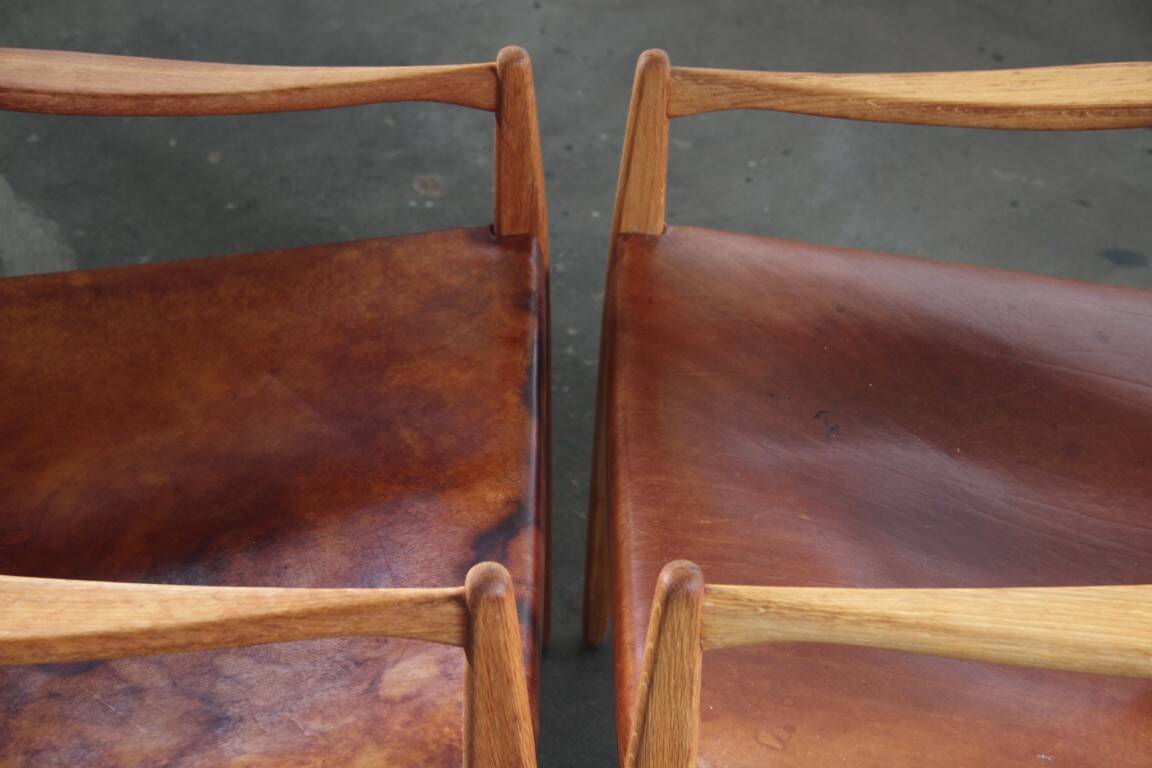Pair of vintage Per-Olof Scotte "Premier 69" oak armchairs in cognac leather