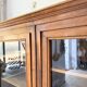 Glass-fronted walnut library 1900