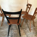 Set of 4 mismatched vintage chairs compass legs