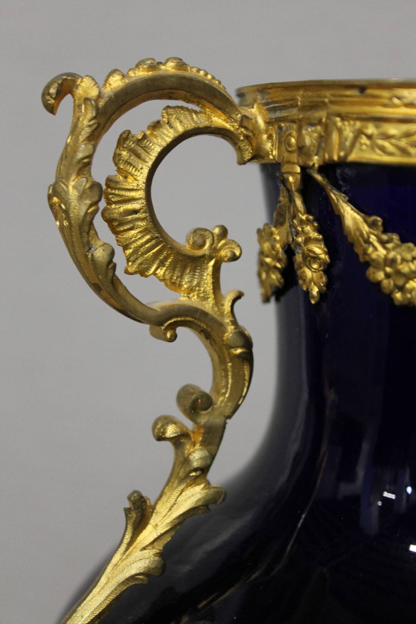 Vase signed Legastelois in blue ceramic of Sèvres and gilded bronze