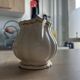 Old cream jug "Nous deux" in Sarreguemines earthenware.