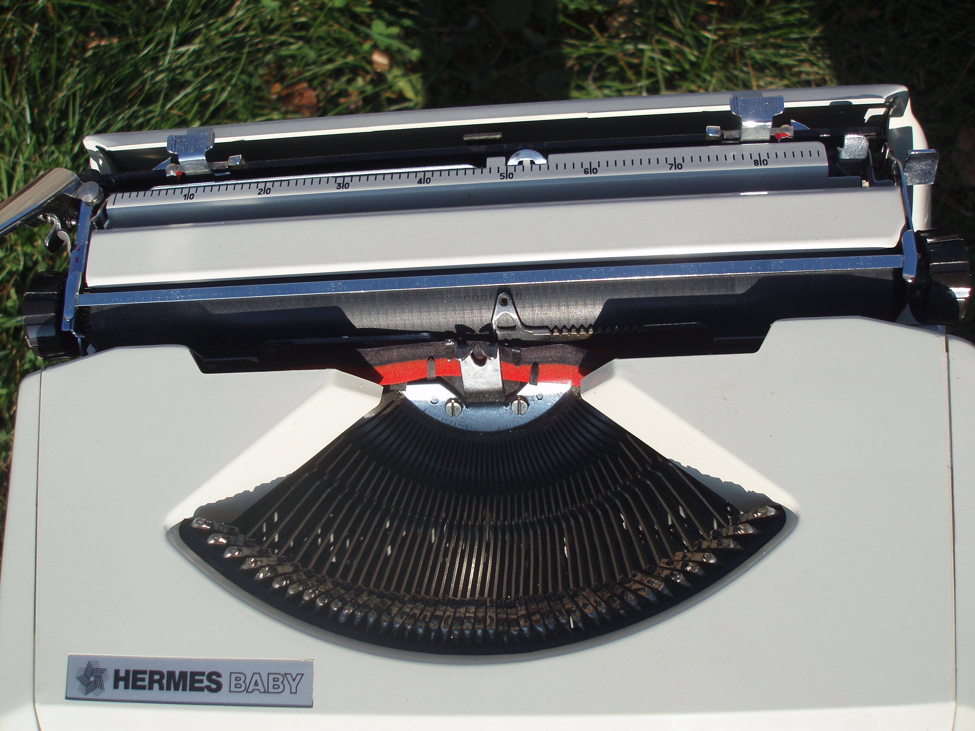 Baby hermes typewriter with manual job and his bag
