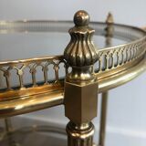 Neoclassical style rolling table in brass
