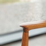 Vintage armchair with a green nebula design by E. Homa, 1970.