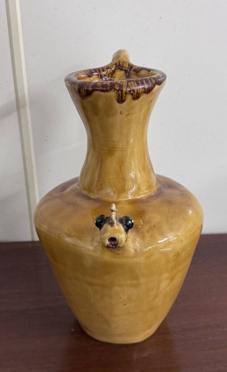 Jug, pitcher, ceramic lady with a glazed finish.