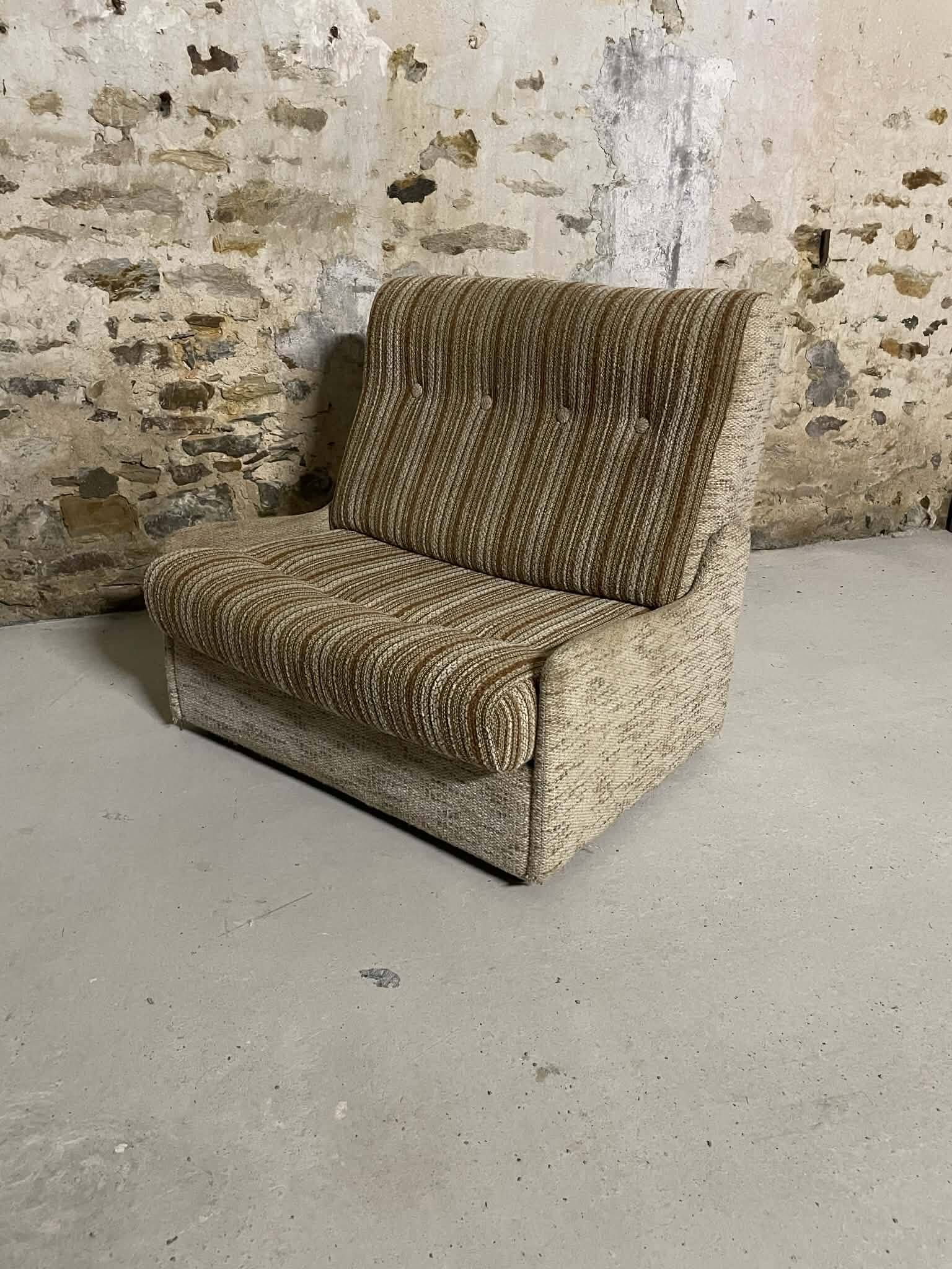 Vintage convertible armchair into a guest bed